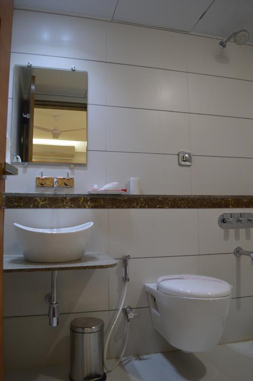 Hotel Ashray Inn Amhedabad Oda fotoğraf